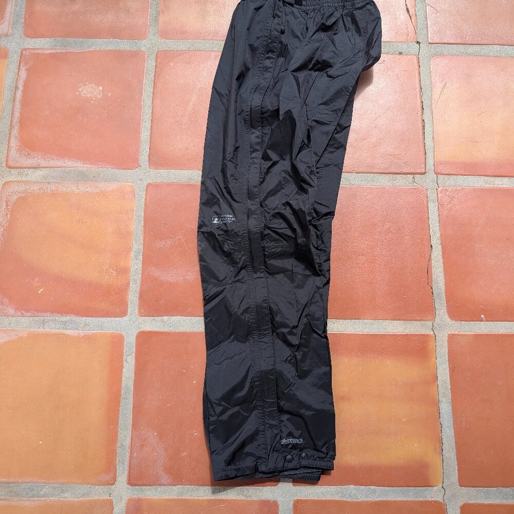 Women's medium full leg zipper rain , waterproof pants black , new without tags